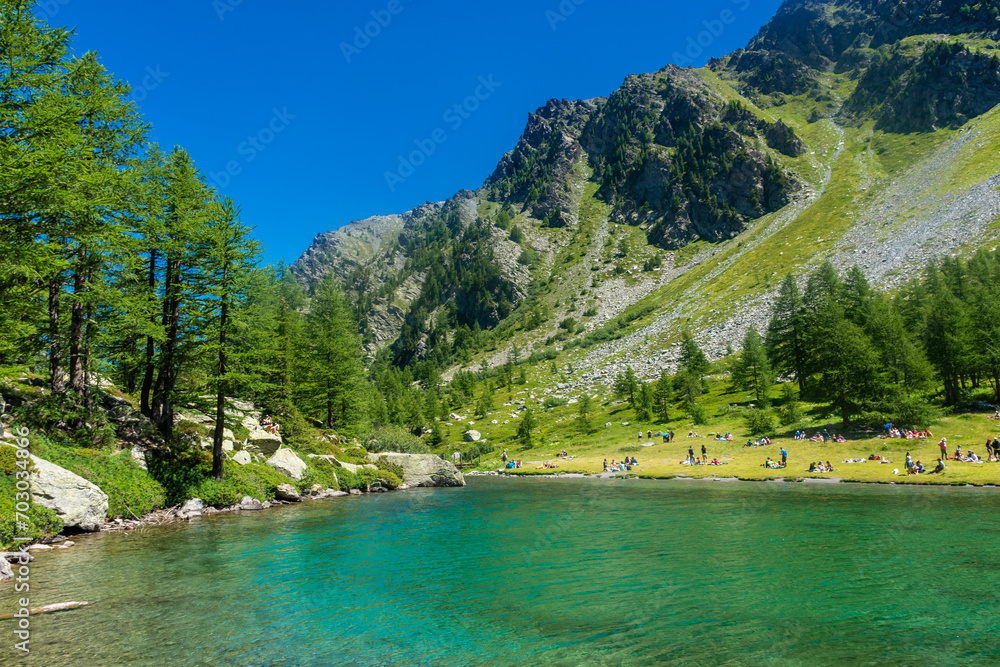 Morgex, Italy, 10 July 2022:  The beautiful crystal clear water of the Arpy Lake in Aosta Valley