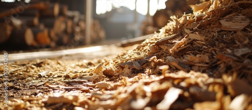Recycled wood waste transformed into high-quality fuel through shredding, milling, and compression. photo