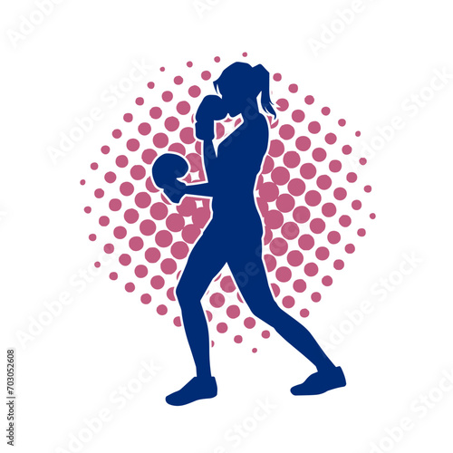 Silhouette of woman boxing athlete in action pose. Silhouette of a female wearing boxing gloves for boxing sport.
