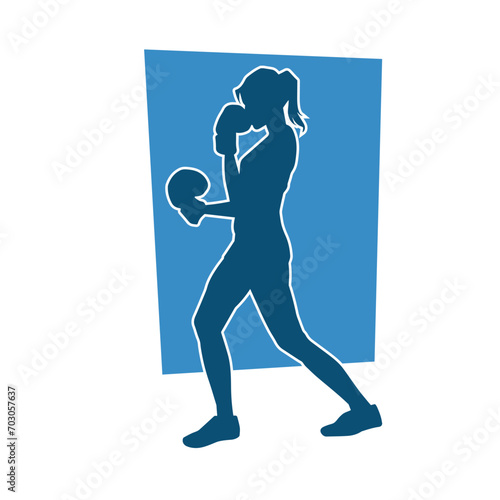 Silhouette of woman boxing athlete in action pose. Silhouette of a female wearing boxing gloves for boxing sport.