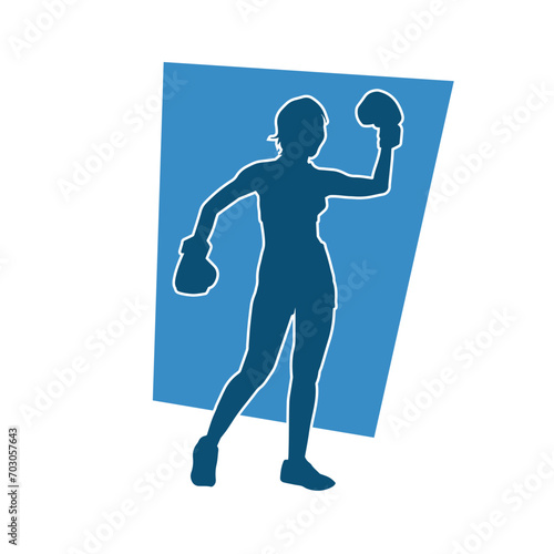 Silhouette of woman boxing athlete in action pose. Silhouette of a female wearing boxing gloves for boxing sport.