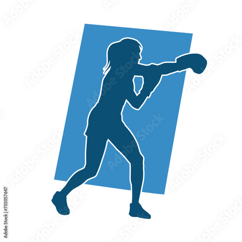 Silhouette of woman boxing athlete in action pose. Silhouette of a female wearing boxing gloves for boxing sport.