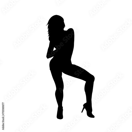 Silhouette of a young slim female model in tight outfit. Silhouette of a slim woman in feminine pose. 