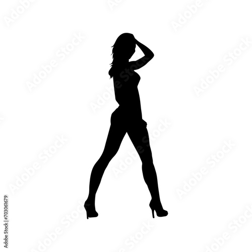 Silhouette of a young slim female model in tight outfit. Silhouette of a slim woman in feminine pose. 