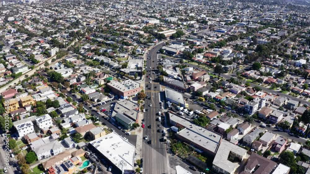 Revealing Aerial View of Los Angeles CA Cityscape Skyline From Mid City Residential Neighborhood, Drone Shot Revealing Aerial View of Los Angeles CA Cityscape Skyline From Mid City Residential Neighborhood, Drone Shot