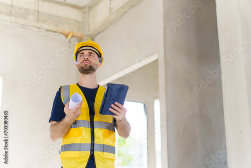 Senior professional caucasian white male real estate foreman inspecting inside the building construction.