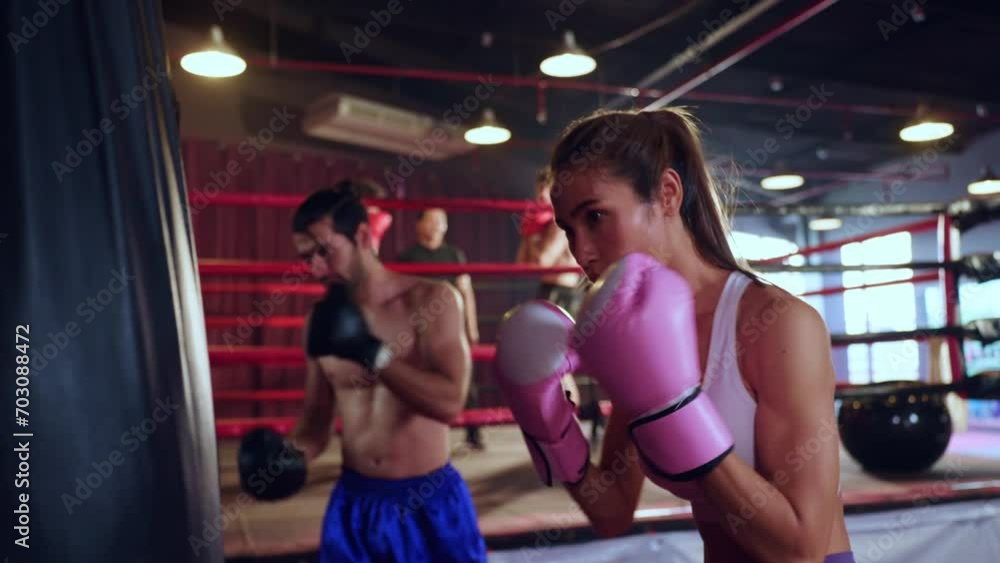 Asian beautiful athlete girl boxer doing workout in fitness stadium. Asian beautiful athlete girl boxer doing workout in fitness stadium.