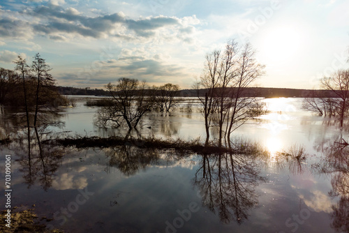 River flood during spring flood at sunset