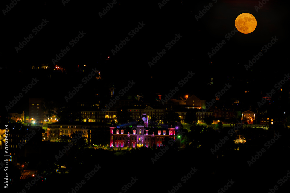 Composite of full moon over Woodburn Hall - Same night moon was mover left in picture to be closer to Woodburn Hall Composite of full moon over Woodburn Hall - Same night moon was mover left in picture to be closer to Woodburn Hall