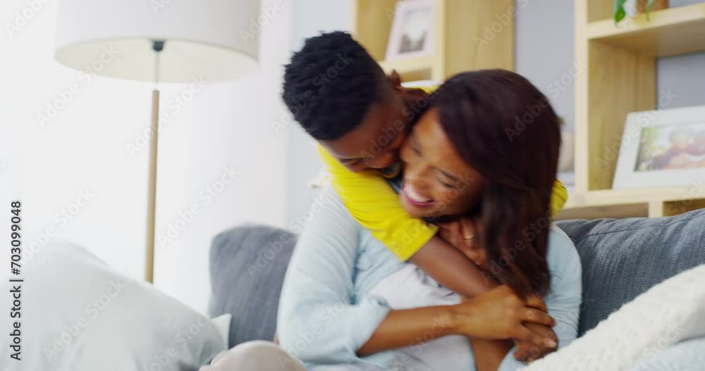 Hug, laughing and mother with child on sofa in home for bonding, happy relationship and fun together. Black family, parents and mom and boy smile in living room embrace for care, trust and relax Hug, laughing and mother with child on sofa in home for bonding, happy relationship and fun together. Black family, parents and mom and boy smile in living room embrace for care, trust and relax