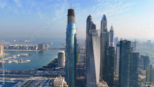 Aerial view of Dubai Marina. Dubai Marina is an affluent residential neighborhood known for The Beach. photo