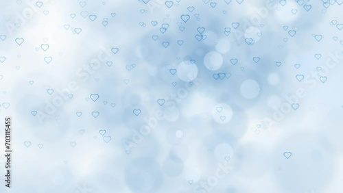  Beautiful white blue bokeh with flying hearts loop animation background. Concept Valentine's day animation.