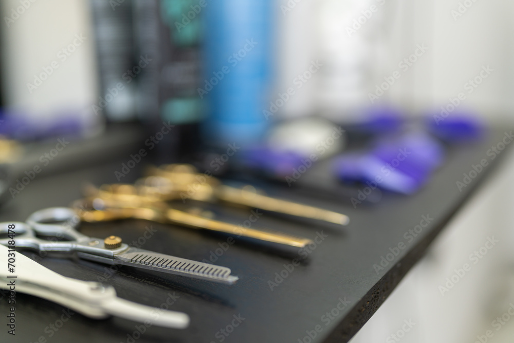 Board with scissors and tools in a barber shop Board with scissors and tools in a barber shop