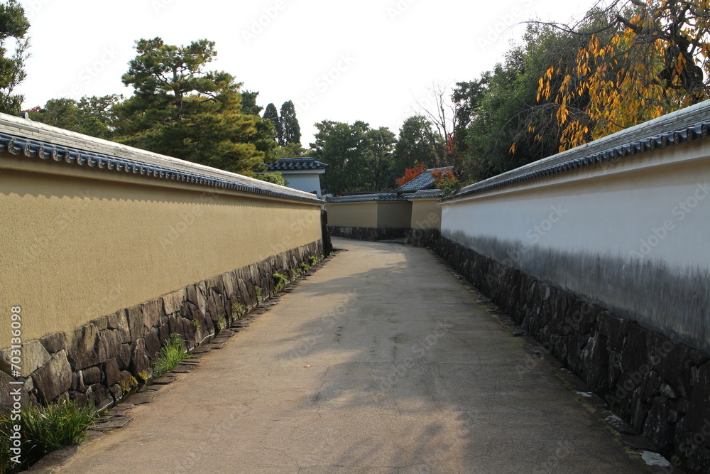 White walls and autumn leaves at Koko-en Garden in the early morning, Himeji, Japan White walls and autumn leaves at Koko-en Garden in the early morning, Himeji, Japan
