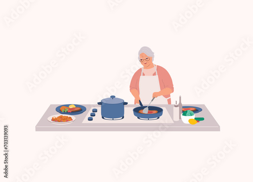 One Smiling Senior Woman With Apron Cooking Dinner With Frying Pan On Top Of Kitchen Stove. Half Length.