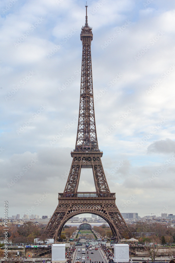 Eiffel Tower seen from Trocadero viewpoint during a winter cloudy day.