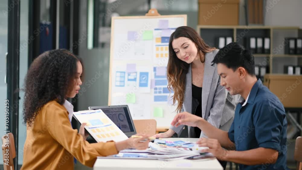 Young business creative team are brainstorming planning discussing while sitting in creative business discussing work Young business creative team are brainstorming planning discussing while sitting in creative business discussing work
