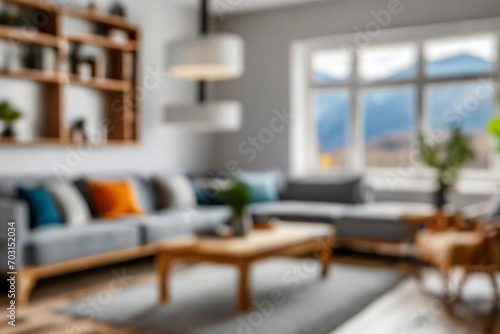 Blurred view of modern living room with sofa and soft bench 