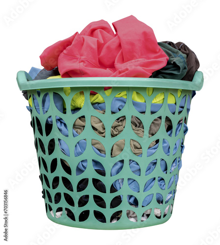 Canvas Print Green laundry basket with colorful clothes