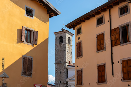 Stroll along narrow urban street that meanders towards magnificent Chiesa di San Giovanni in Xenodochio. Old town of charming town of Cividale del Friuli, Udine province, Friuli Venezia Giulia, Italy