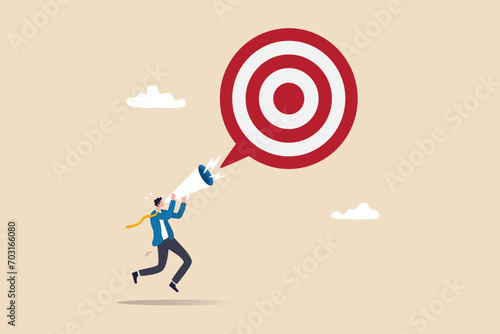 Announce new year goal, resolution or business objective, target or purpose, motivation to success or challenge, business agenda concept, businessman announce new goal or target with megaphone.