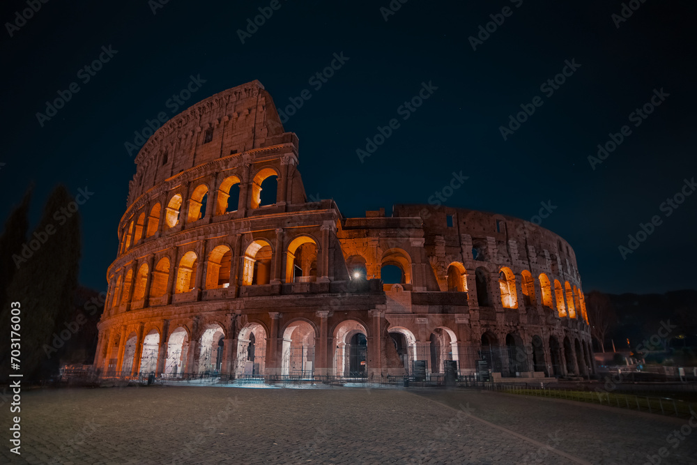 Colosseum beautiful view illuminated at night without people. Rome, Italy