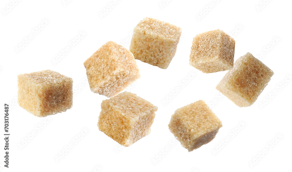 Cubes of brown sugar falling on white background Cubes of brown sugar falling on white background