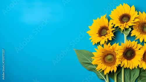 Bouquet of sunflowers on blue background top-down copy space  generative ai