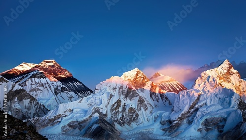The twilight sky over Mount Everest, Nuptse, Lhotse, and Makalu photo