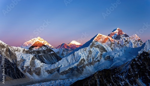 The twilight sky over Mount Everest, Nuptse, Lhotse, and Makalu photo