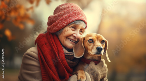 Fényképezés Senior woman hugs her beagle dog in countryside