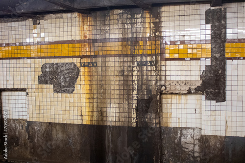 Photography Urban subway station with vintage walls rusting surfaces and broken tiles in Bro