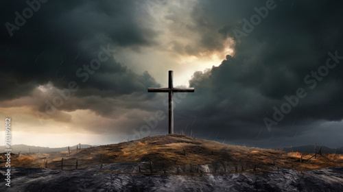 Light and ray of light shining through the sky and clouds on the hill of Golgotha. Holy cross background symbolizing the death and resurrection of Jesus. Easter.