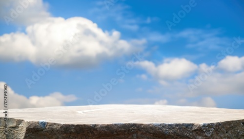 Stone podium table top outdoors on sky cloud blurred background