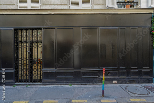 typical french boutique facade, parisian black painted storefront template