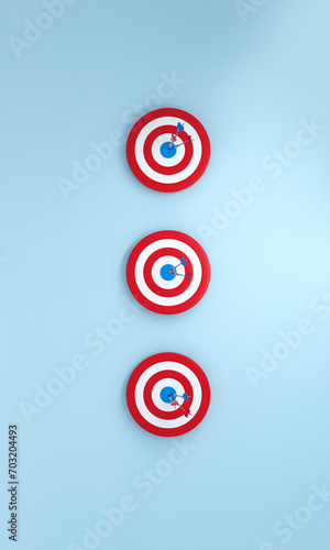 Row dart hitting target on blue background. Bullseye success concept. Vertical Size.