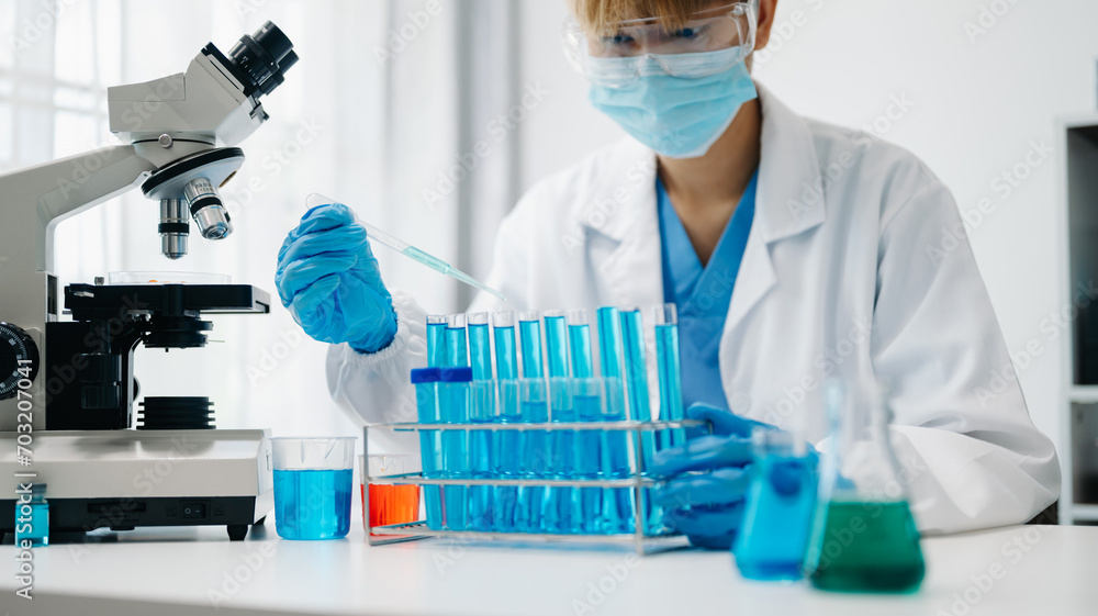 female scientist working with micro pipettes analyzing biochemical samples, advanced science laboratory female scientist working with micro pipettes analyzing biochemical samples, advanced science laboratory