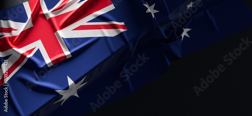 Flag of Australia. Fabric textured Australia flag isolated on dark background. 3D illustration photo