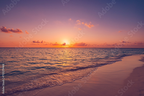 Sea sand sky concept  sunset colors clouds beachfront horizon. Inspire waves beams  meditation nature landscape  beautiful colors  wonderful scenery of tropical beach. Beachside travel summer vacation