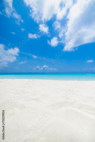 Closeup sandy beach, sunny blue sea sky. Panoramic beach landscape. Empty tropical beachfront and seascape copy space. White soft sand texture, calmness, tranquil relaxing sunlight, summer dream mood