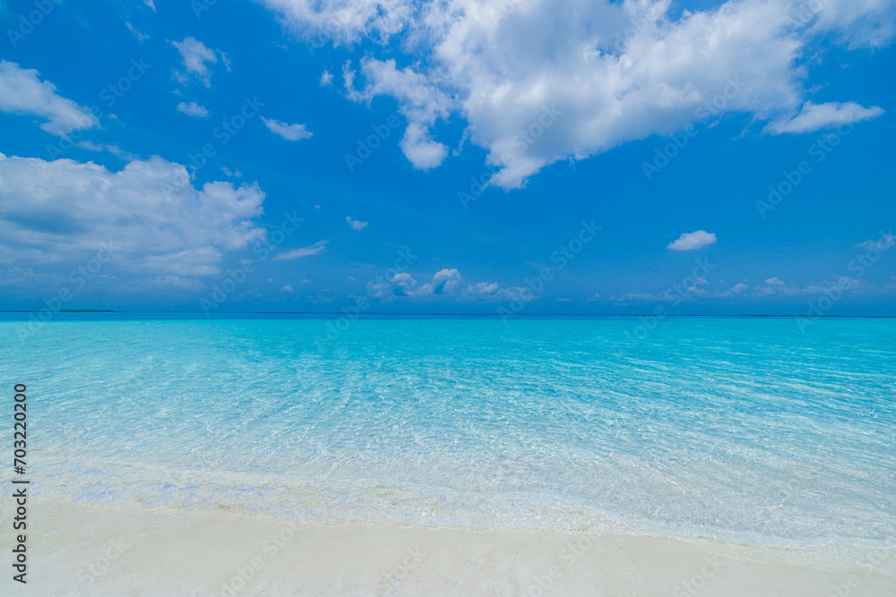 Closeup sandy beach, sunny blue sea sky. Panoramic beach landscape. Empty tropical beachfront and seascape copy space. White soft sand texture, calmness, tranquil relaxing sunlight, summer dream mood Closeup sandy beach, sunny blue sea sky. Panoramic beach landscape. Empty tropical beachfront and seascape copy space. White soft sand texture, calmness, tranquil relaxing sunlight, summer dream mood