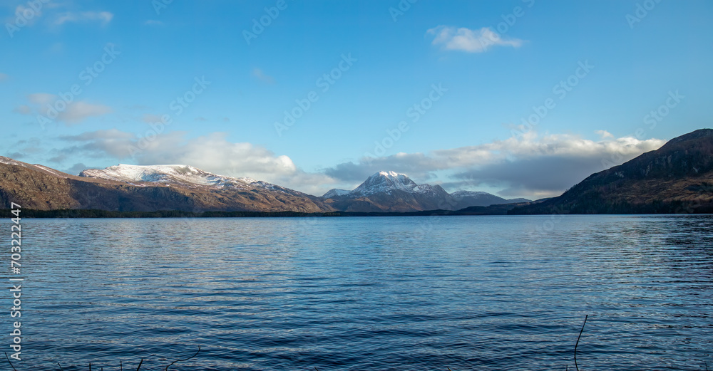 View of Slioch, mountain range in Torridon from across Loch Maree