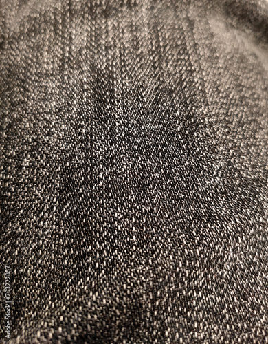 Black denim texture. Jeans background. Close-up. Mockup with copy space