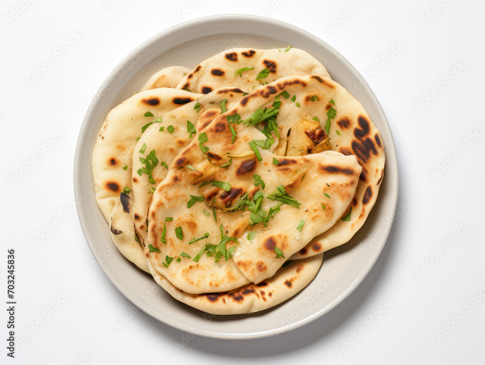 Indian naan bread on white background top view Indian naan bread on white background top view