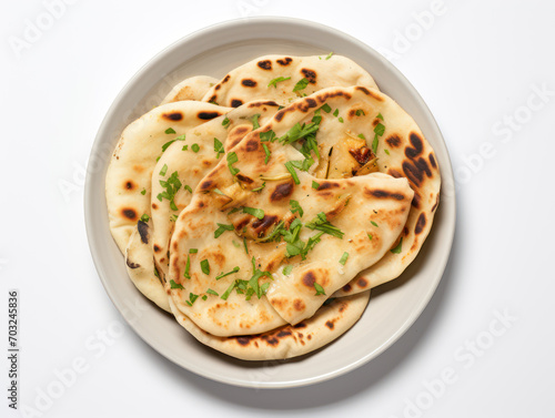Indian naan bread on white background top view