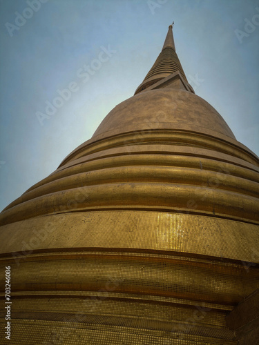 golden pagoda in temple at bangkok