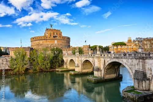Castel Sant'Angelo and the Sant'Angelo bridge  over Tiber river during sunny day in Rome, Italy. photo