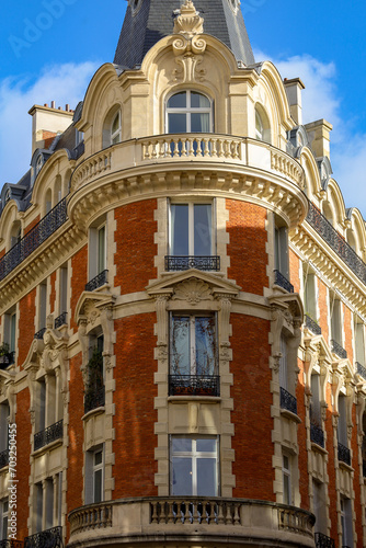 real estate , haussmannian architecture in Paris , red bricks facade © eric