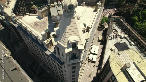Aerial view tilt down establishing over the Ariztia building in La Bolsa neighborhood, heritage of Santiago, Chile. New York Street