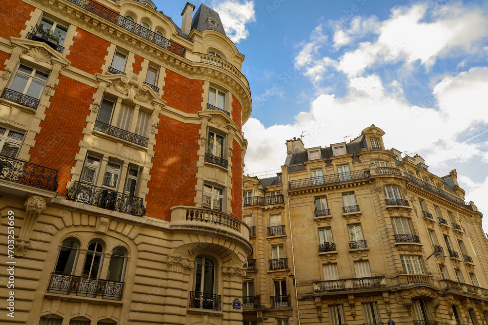 typical parisians building facade , haussmannian style  ,5th arrondissement